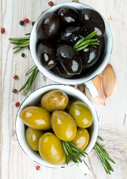 istock green and black olives 518761634