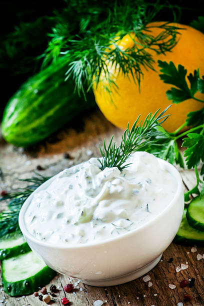 istock Ranch sauce in a white porcelain bowl with vegetables 518764230