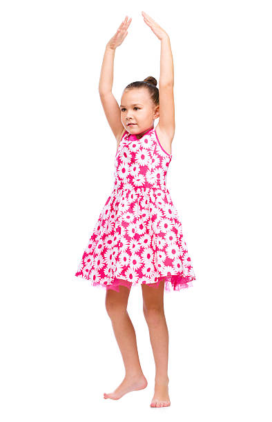 istock Cute girl dancing 518775515