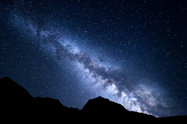 istock Mountain landscape with Milky Way. Night starry sky 518777316