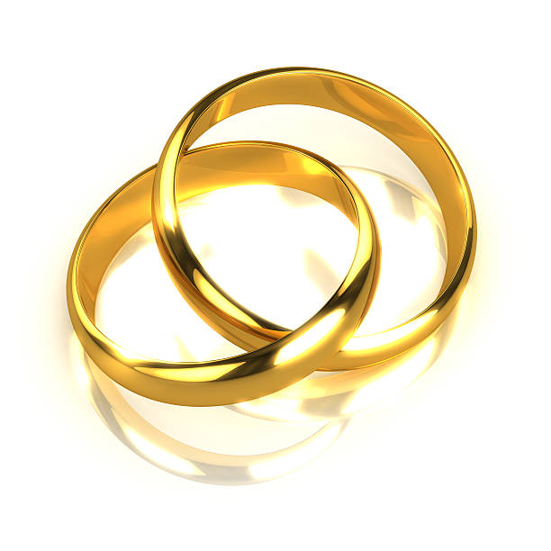 istock 3d Pair of gold rings entwined 518777499