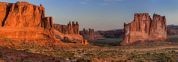 istock Three Gossips Rock Formation in Arches National Park at Sunrise 518778050