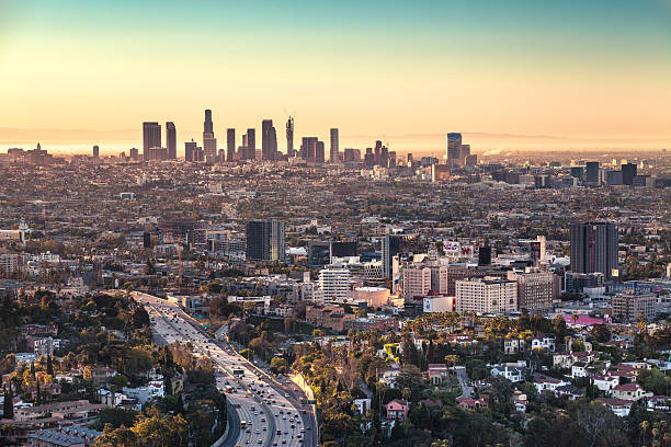Los Angeles Skyline And Hollwood At Sunrise, Hollwood Bowl Overlook stock photo
