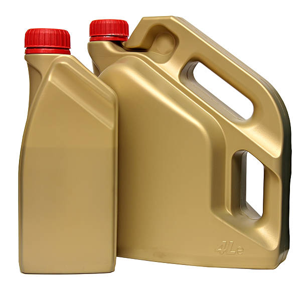 istock Plastic bottles from automobile oils isolated on white background 518780110