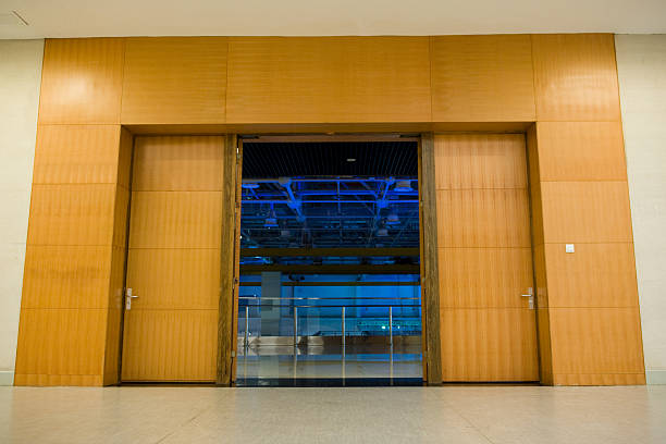 istock double wooden door open 518780489
