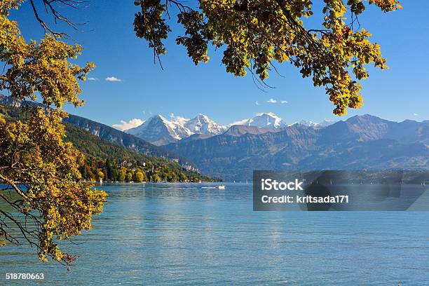 Lake Thun With Jungfrau Mountain In Autumn Clear Blue Sky Stock Photo - Download Image Now