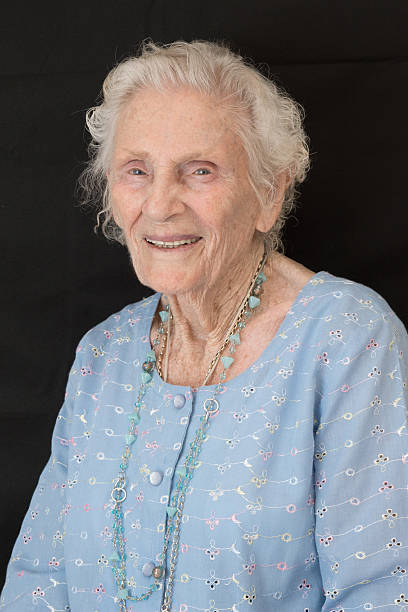 istock Portrait of elderly lady smiling 518782460