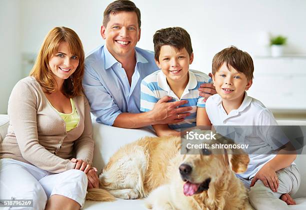 Restful Family Stock Photo - Download Image Now - Dog, Family, Happiness