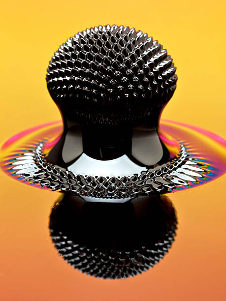 Ferrofluid structure induced by a neodymium magnet reflecting colorful lights