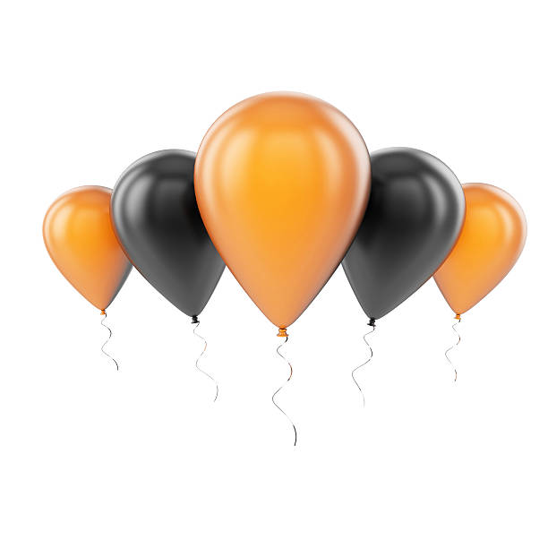 istock Black and orange balloons against a white background 518798137
