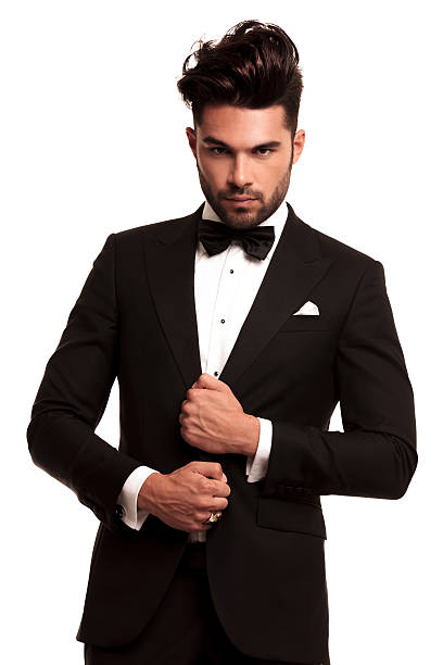 Stylish Man In Elegant Black Suit And Bowtie Stock Photo - Download Image  Now - Males, Suit, Bow Tie - Istock
