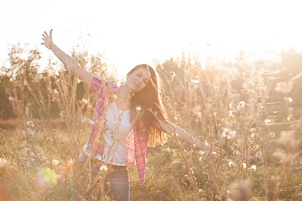 istock Beautiful girl in the park 518798549