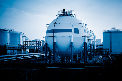 Oil tanks at the depot ,blue toned image.
