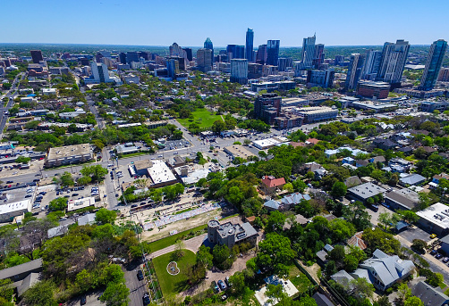 Aerial Austin Spring 2016 Capital Cities of America downtown view over the capital city of ATX. With the skyline cityscape in the background on a clear sunny bright day over the graffiti wall and castle hill. With the Castle at the bottom of the image 