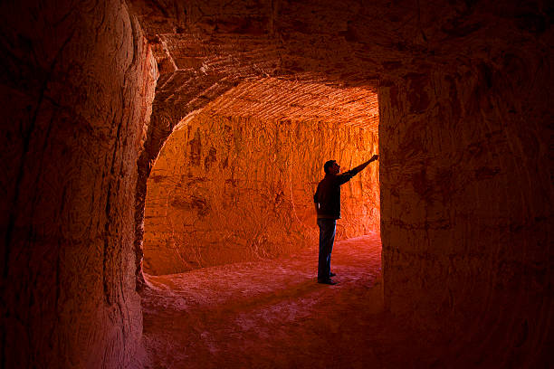 Man in Mine Tunnel, Coober Pedy, South Australia, Australia stock photo