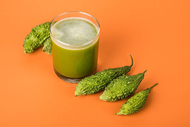 istock fresh Juice of bitter gourd, Bitter Melon, Bitter cucumber 518802422