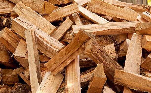 chopped firewood Background of the chopped firewood firewood stock pictures, royalty-free photos & images