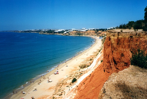 Praia Da Falesia, near Albufeira, Algarve. The beach takes its name from the red cliffs that form a backdrop to the long stretch of sand