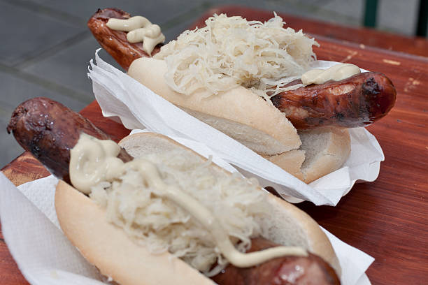 istock hot dog with mustard and vegetables 518806342