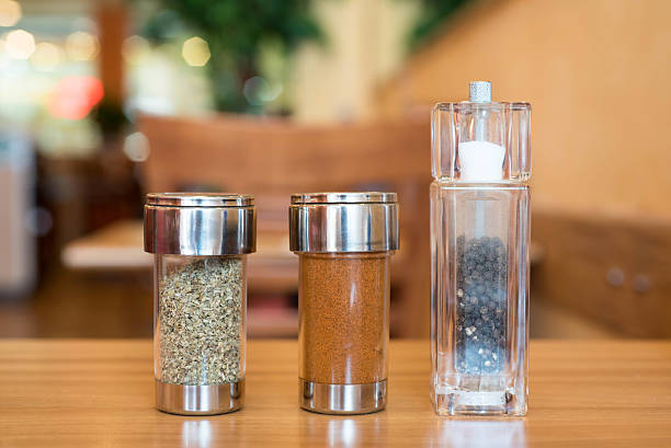 istock cayenne pepper Oregano and black pepper on table 518813552