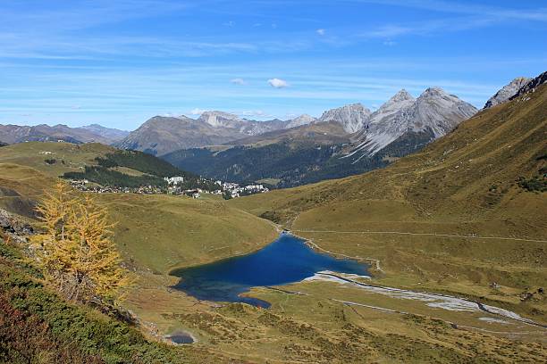 Blue lake Schwellisee and Arosa Autumn scene in the Swiss Alps. arosa photos stock pictures, royalty-free photos & images