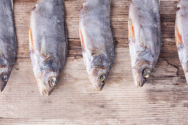istock Dried fish backgriund on the table 518815038