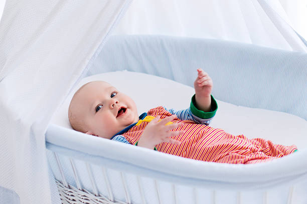 istock Cute baby in white nursery 518815972