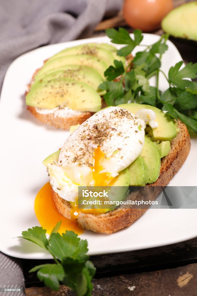 sandwich with avocado and poached egg Avocado Stock Photo