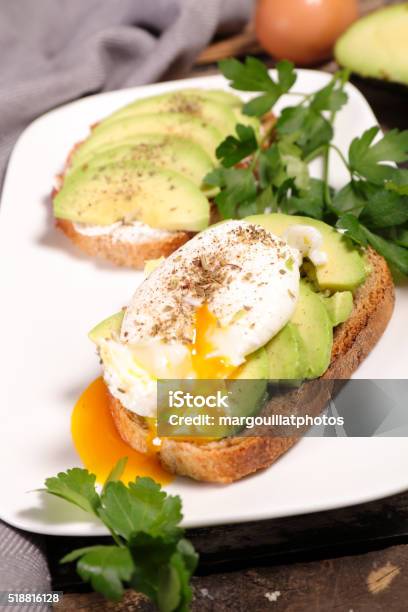 Sandwich With Avocado And Poached Egg Stock Photo - Download Image Now - Avocado, Breakfast, Canape