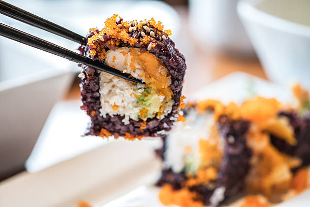 background of different sushi rolls