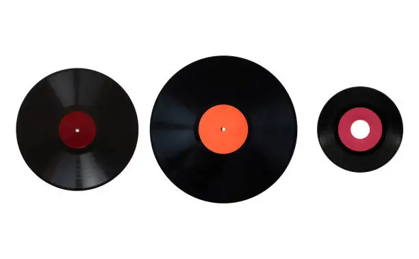 Size comparison of many analogue recording media for music. Left to right: shellac record 78 rpm, vinyl record 33 rpm and 45 rpm