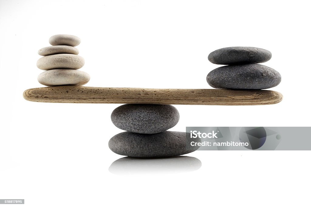 balancing stones on white balancing stones on white background Balance Stock Photo