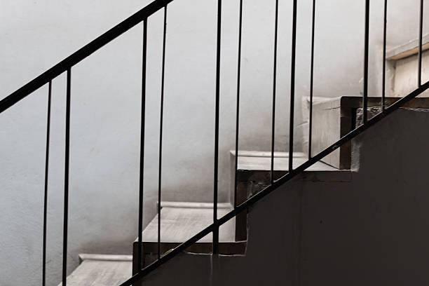 istock Stone stairs with metal railing 518819360