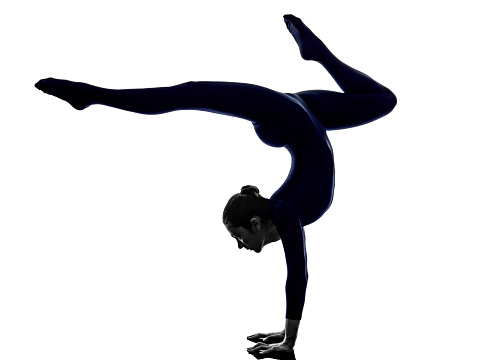 woman exercising Eka Pada Viparita Dandasana pose yoga silhouette shadow white background