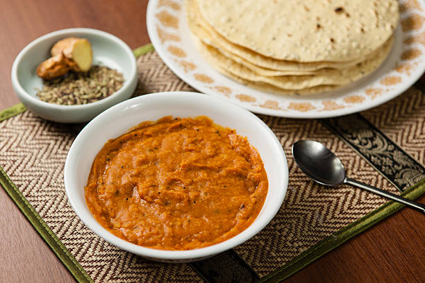 istock Masoor Dal (Indian Lentil Recipe) with Papad 518819551