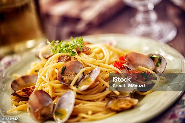 Delicious Spaghetti Alla Vongole Served On A Plate Stock Photo - Download Image Now - Italian Food, Pasta, Spaghetti