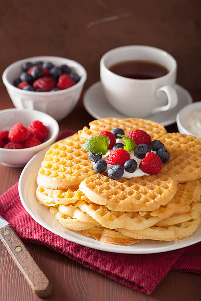 istock waffles with creme fraiche and berries for breakfast 518819984