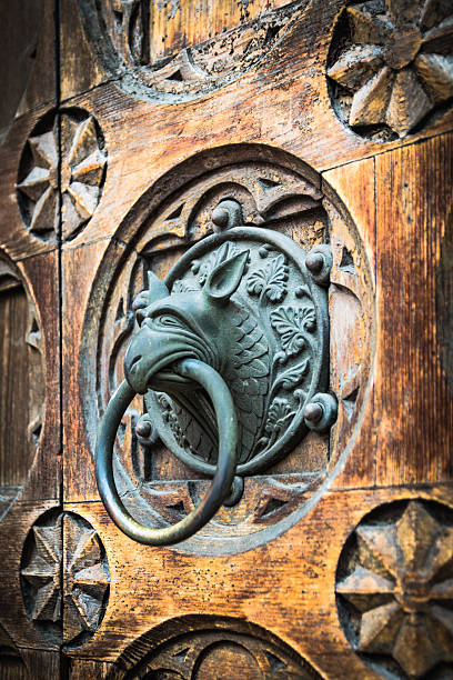 istock Antique door knocker shaped monster's head. 518820070