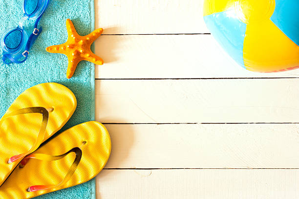 istock Summer accessories on the wooden Background 518820138