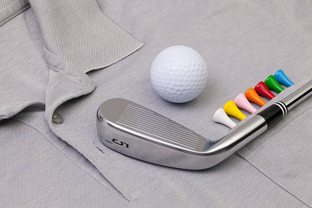 istock Grey shirt and golf equipments 518829738