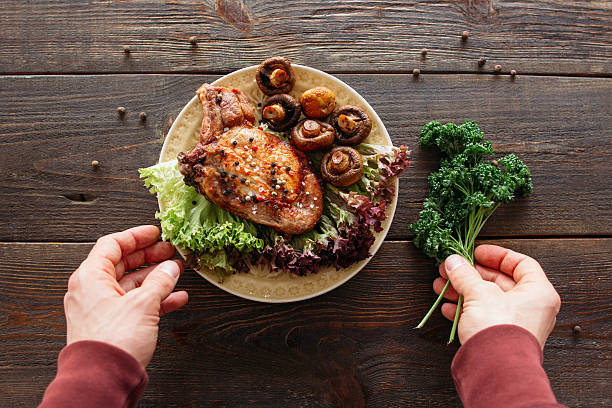 istock Steak serving. Grilled meat with fresh vegetables. 518832588