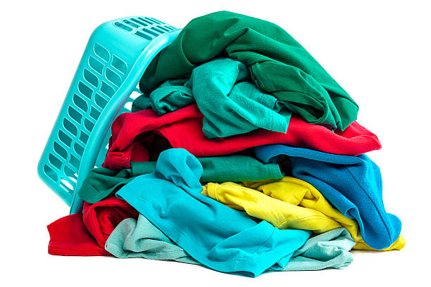 istock Clothes to wash and a plastic container. 518840906