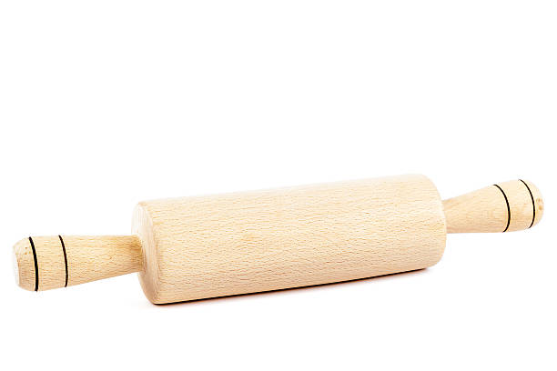 istock Wooden rolling pin on white background. 518841484