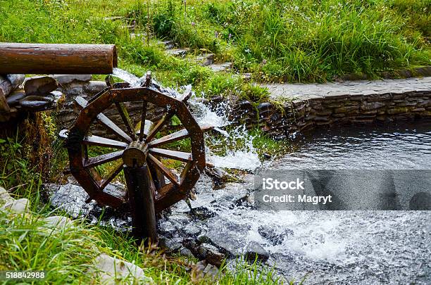 Working Watermill Wheel With Falling Waterin The Village Stock Photo - Download Image Now