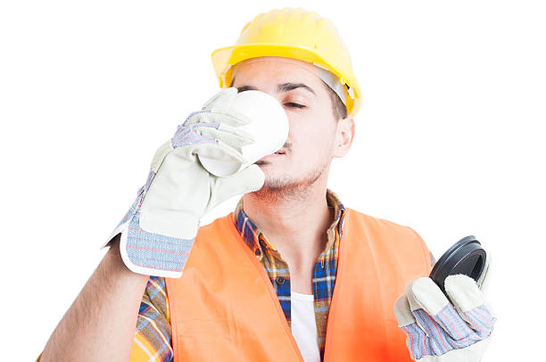 istock Closeup portrait of constructor drinking a coffee on his break 518844466
