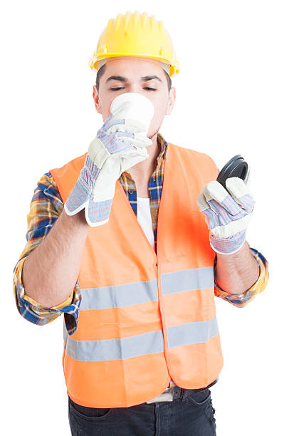 istock Male engineer in workwear drinking his morning coffee 518844506