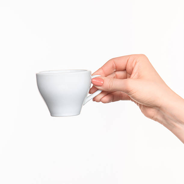 Woman hand with cup on white background