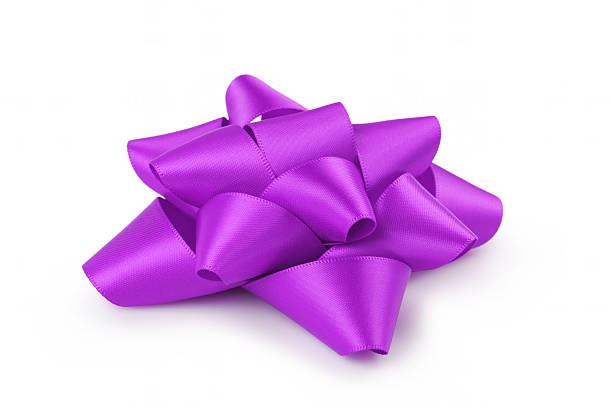 istock purple ribbon gift bow isolated on white 518847476