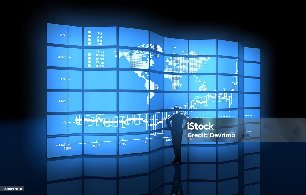 Global Exchange Genius businessman watching dotted world trade map on multiple monitors. Computer Monitor Stock Photo