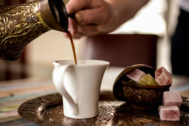 istock Pouring a cup of thick Turkish coffee 518853466